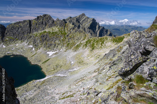 The High Tatras - Slovakia - The look from Bystre sedlo mountain gap to Krivan peak in the background and the lake - Vysne Wahlenbergovo pleso. photo