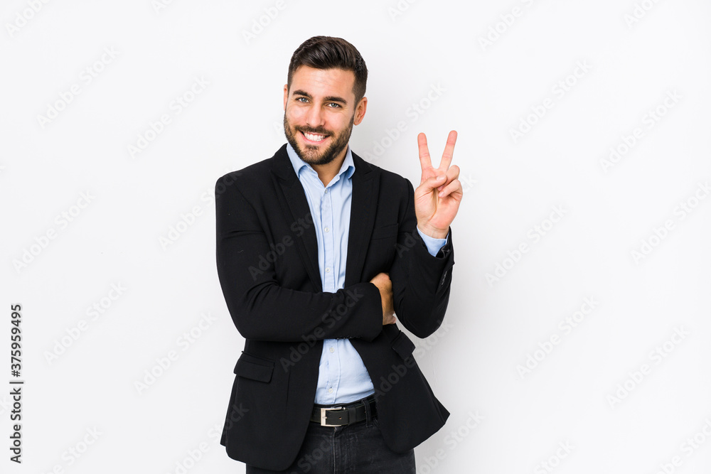 Young caucasian business man against a white background isolated showing number two with fingers. Young caucasian business man against a white background isolated showing number two with fingers.