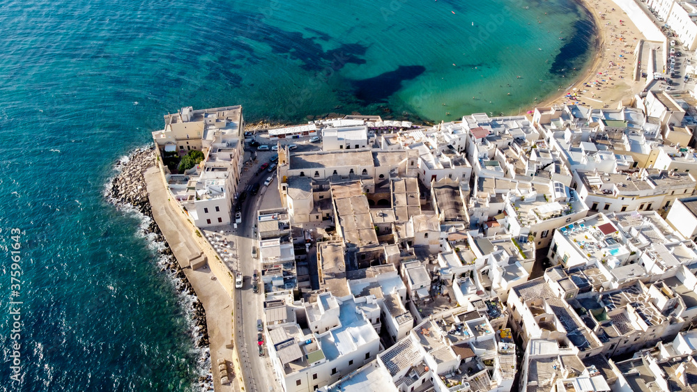 Aerial view of Gallipoli on the Salento peninsula in the south of Italy (Apulia) - Beach of Purity in the old town from above