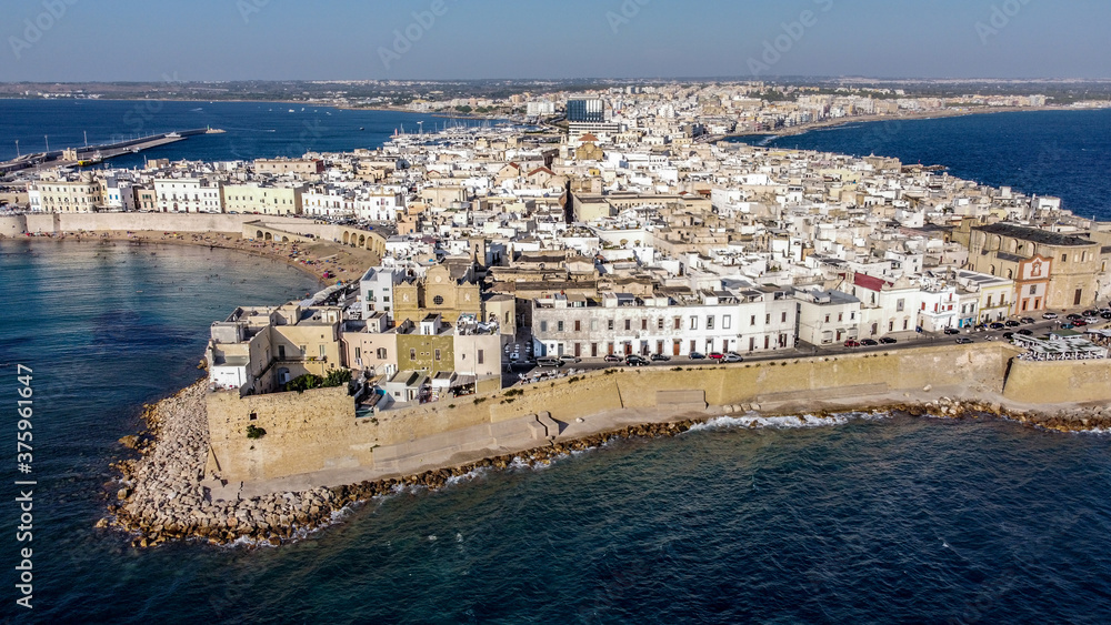 Aerial view of Gallipoli on the Salento peninsula in the south of Italy (Apulia) - Walls protecting the city from the waves of the Ionian Sea
