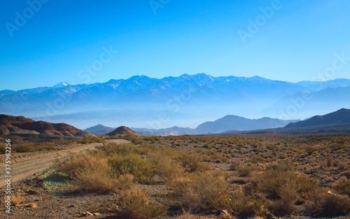 Andean desert landscape beneath a deep blue sky near Uspallata, Mendoza, Argentina.
