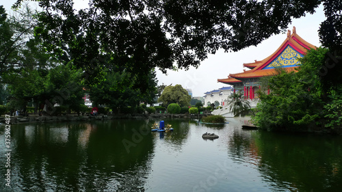 Cloudy view of the National Concert Hall with a pond view