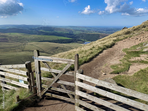 Countryside five bar gate hiking peak district and lake district national parks view of fields and hills 