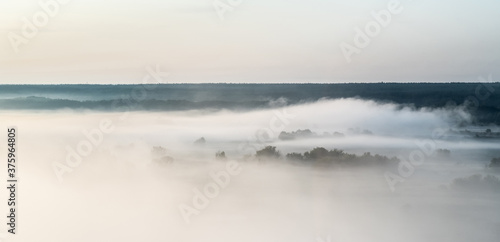 Panoramic view of field obscured with dense fog