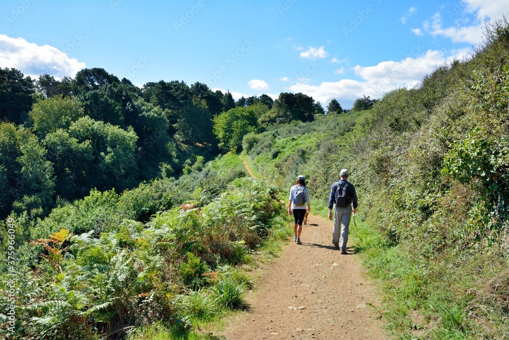 Retired hikers on the path in brittany France