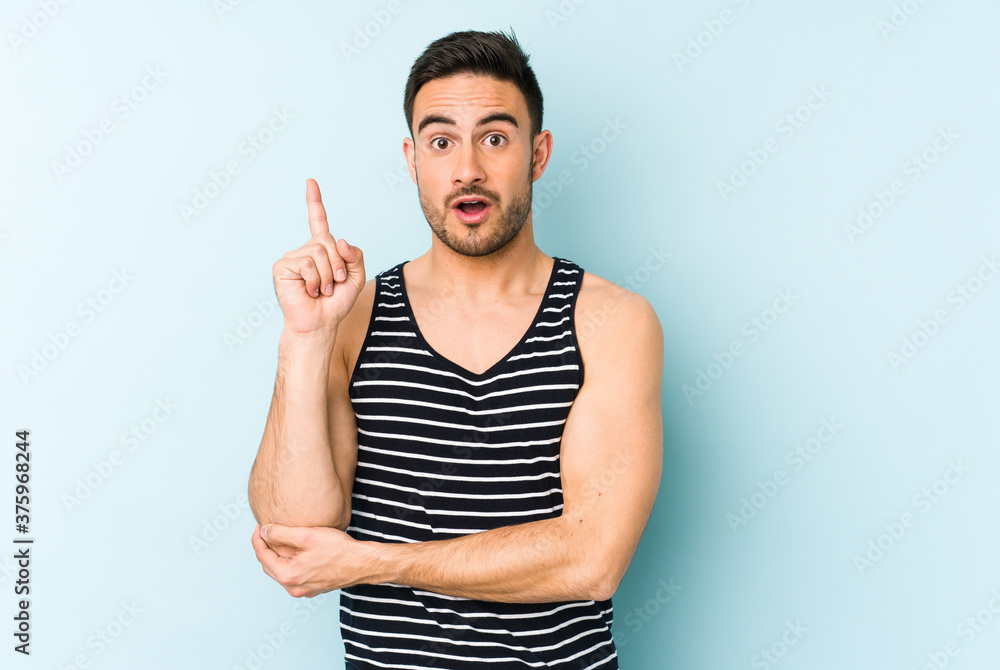 Young caucasian man isolated on blue background having some great idea, concept of creativity. Young caucasian man isolated on blue background having some great idea, concept of creativity.