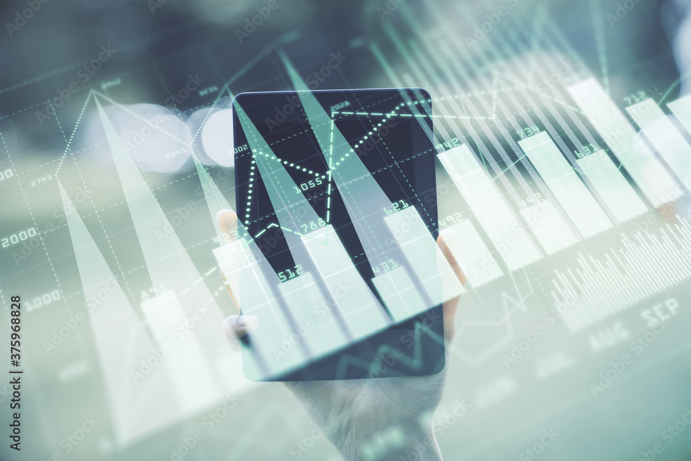 Double exposure of forex chart sketch hologram and woman holding and using a mobile device. Financial market concept. Double exposure of forex chart sketch hologram and woman holding and using a mobile device. Financial market concept.