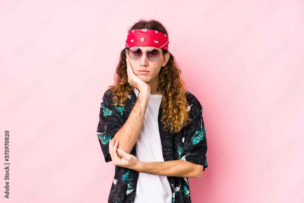 Young hippie caucasian man isolated who is bored, fatigued and need a relax day. Young hippie caucasian man isolated who is bored, fatigued and need a relax day.