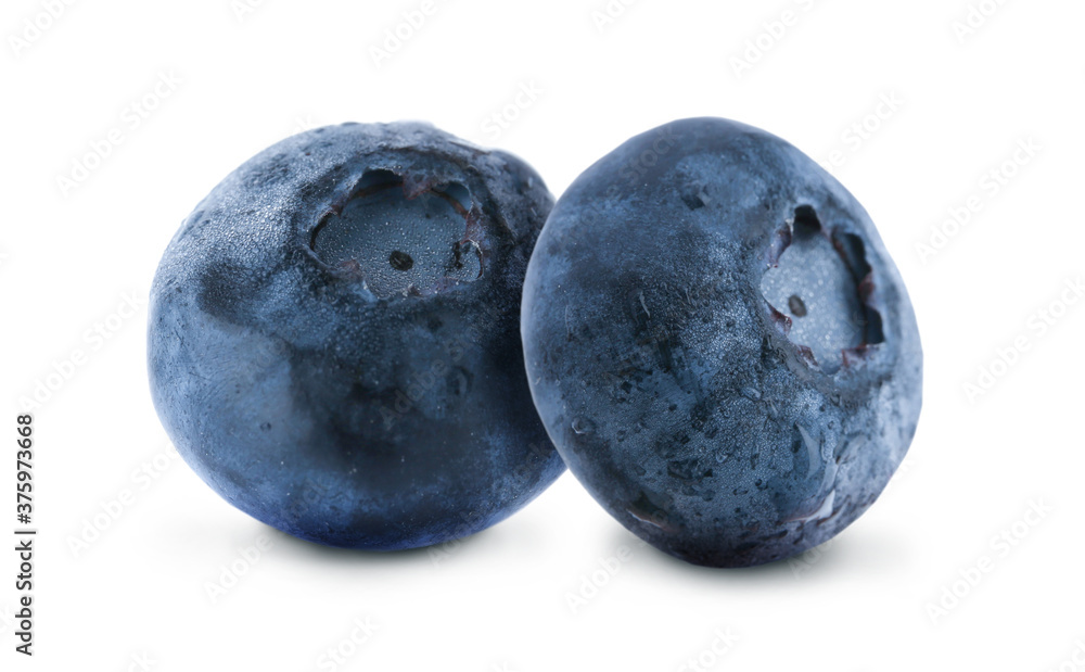 Two whole ripe blueberries on white background Two whole ripe blueberries on white background