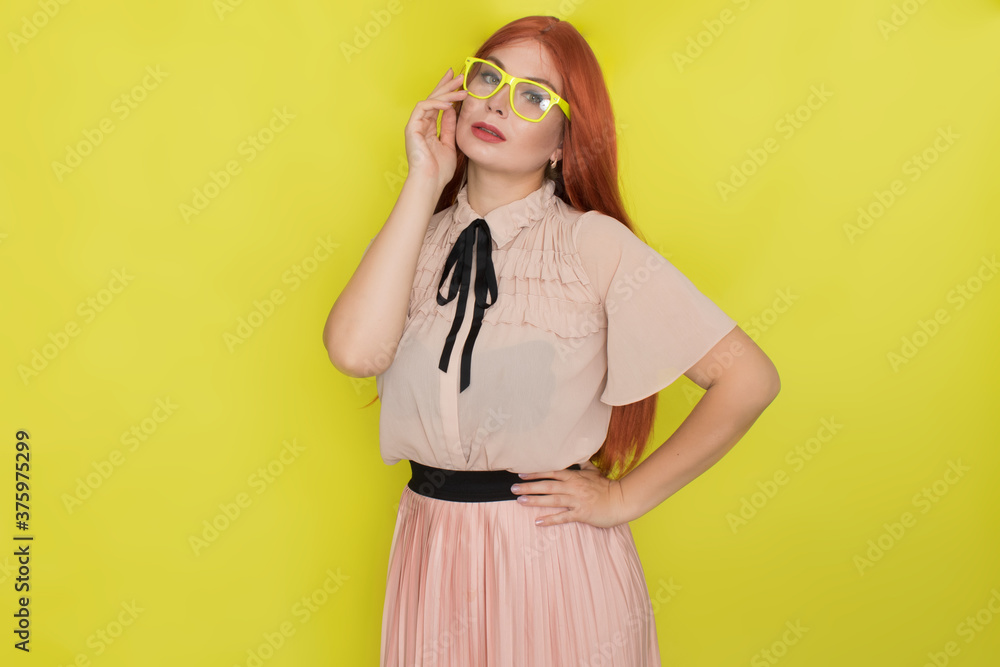 Red haired woman with glasses and office clothing Red haired woman with glasses and office clothing