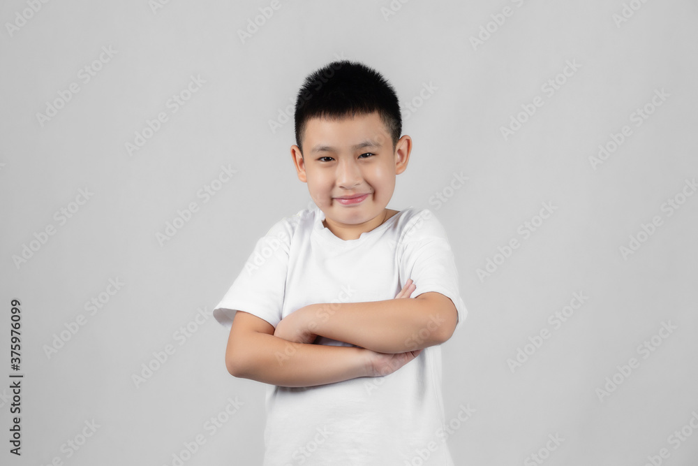 Asian boys studio portrait on gray background