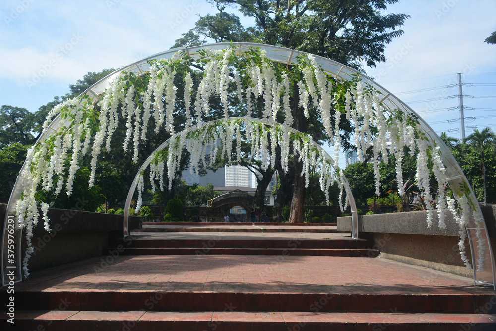 Fototapeta premium Paco park cemetery pathway steps and arch in Manila, Philippines