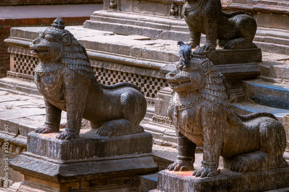The statue of lion at the entrance of Krishna Mandir(Krishna Template) at Patan Durbar Square, Patan