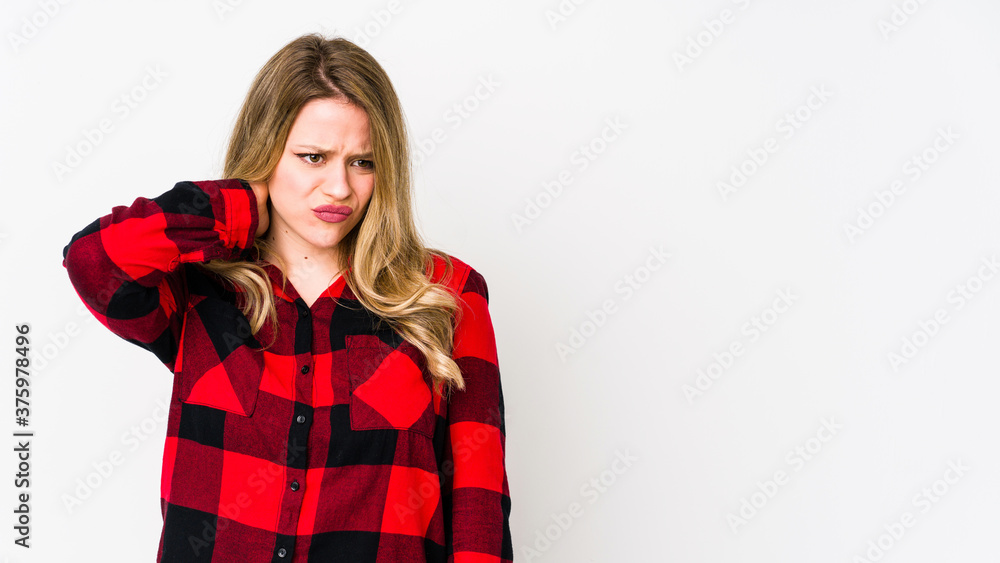 Young cauciasian woman isolated on white background suffering neck pain due to sedentary lifestyle. Young cauciasian woman isolated on white background suffering neck pain due to sedentary lifestyle.