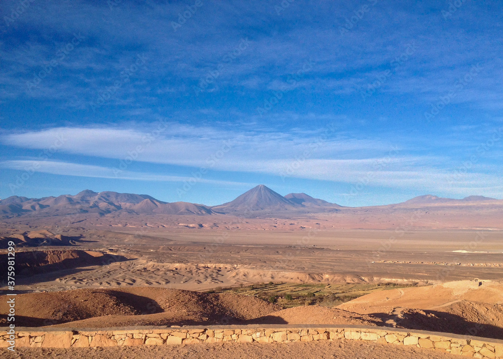 desert path blue sky mountain