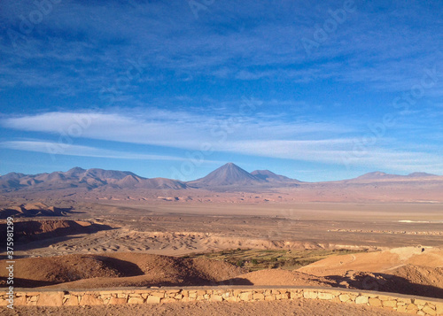 desert path blue sky mountain