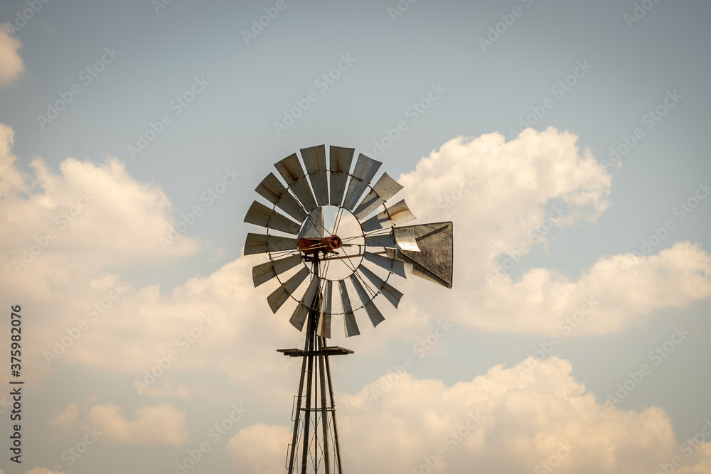 An old windmill in the dry plains of Texas, USA.