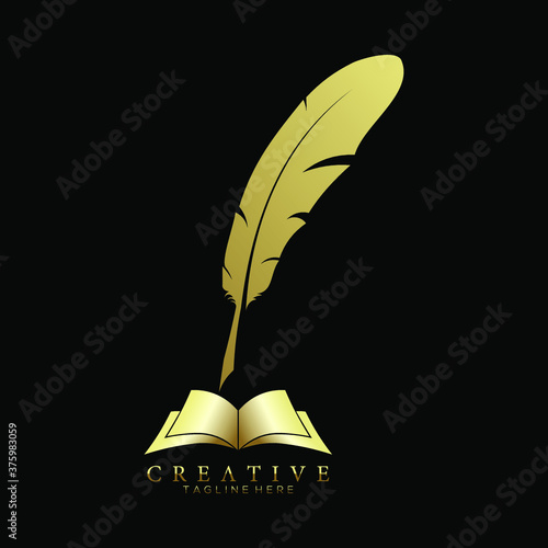 Gold Feather Pen above an Open Book
