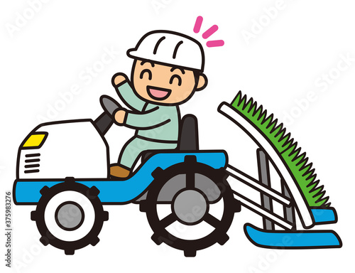 田植え機に乗る男性