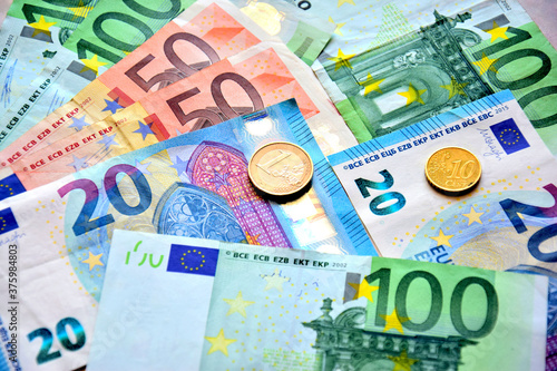 euro banknotes and coins