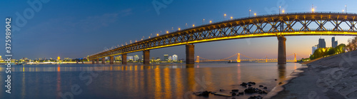 Fototapeta Naklejka Na Ścianę i Meble -  Wuhan Yangtze River and city night and light show scenery