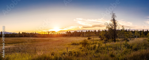 Panoramic View of a Beautiful Canadian Landscape during a Sunny Summer Sunset. Taken near Clinton, British Columbia, Canada. photo