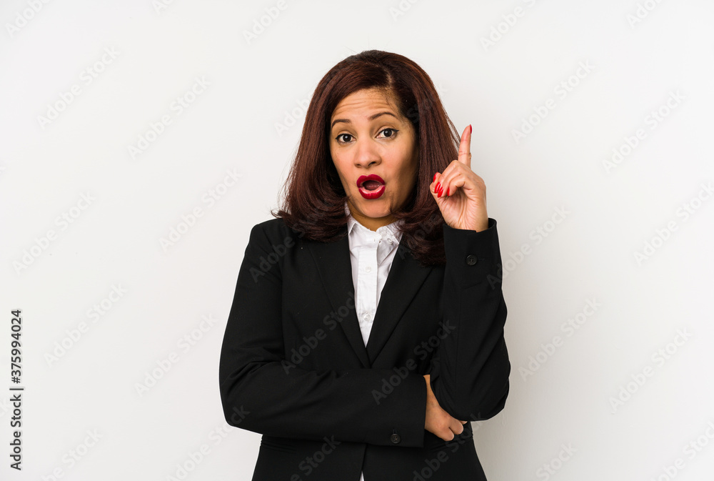 Middle age latin business woman isolated having some great idea, concept of creativity. Middle age latin business woman isolated having some great idea, concept of creativity.