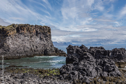 The volcanic black basalt landscape at the coast of Hellnar  a small town in Snaefellsnes  Iceland.