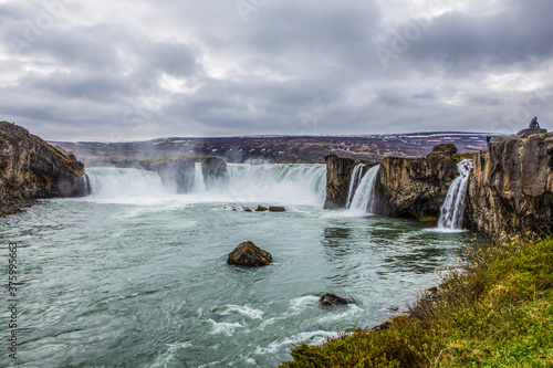 Godafoss, also known as gods waterfall, a big waterfall at the north part of Iceland, during summer time, cloudy day.