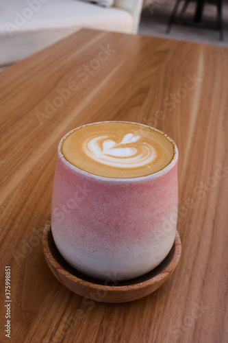 cup of coffe on wooden background