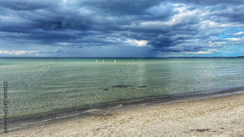 dramatic sky clouds over baltic sea
