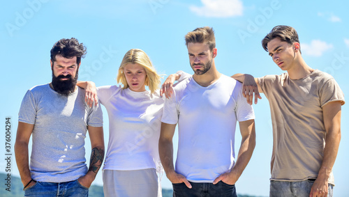 Group sad people. Go social. Youth psychology. Young people bonding. Psychological help. People in depression. Overcoming hard times together. Spending time with friends. Men and woman sky background
