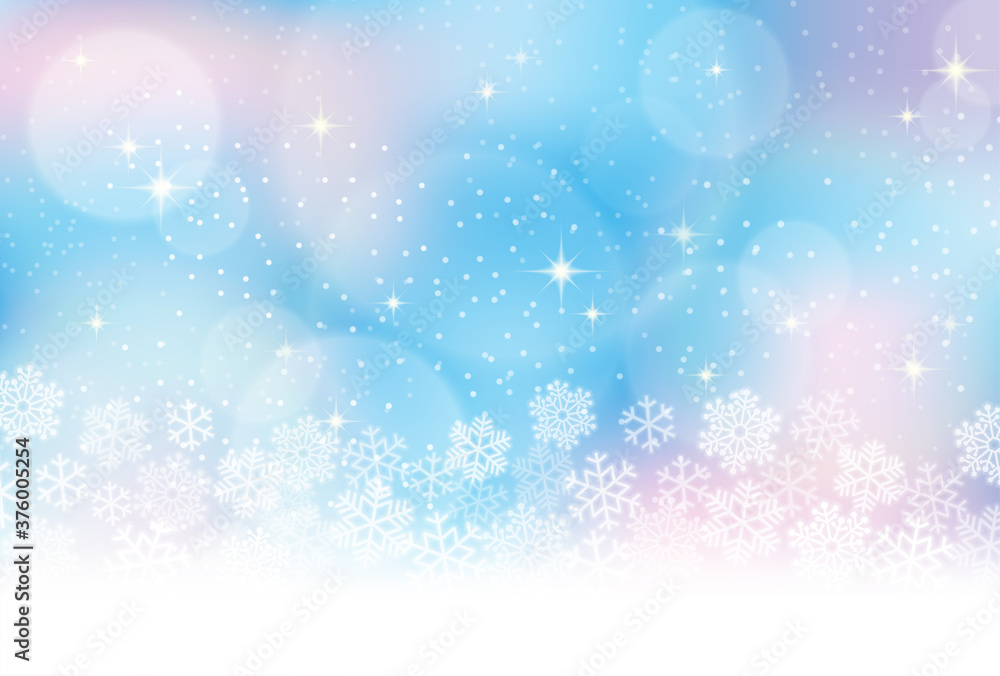 雪の結晶、冬のイメージの水色背景素材