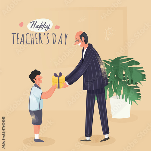 Student Boy Giving Gift to His Class Teacher on The Occasion of Happy Teacher's Day.