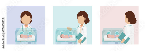 Doctor with baby in incubator