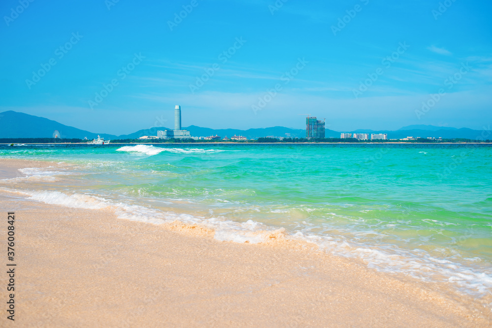 Fototapeta premium Hainan island, Sanya city. Scenic seascape. Wuzhizhou tropical Island for Relax and Water Activities. Sanya city Chinese Resort for summer vacation by the sea. Popular tourism destination in China.