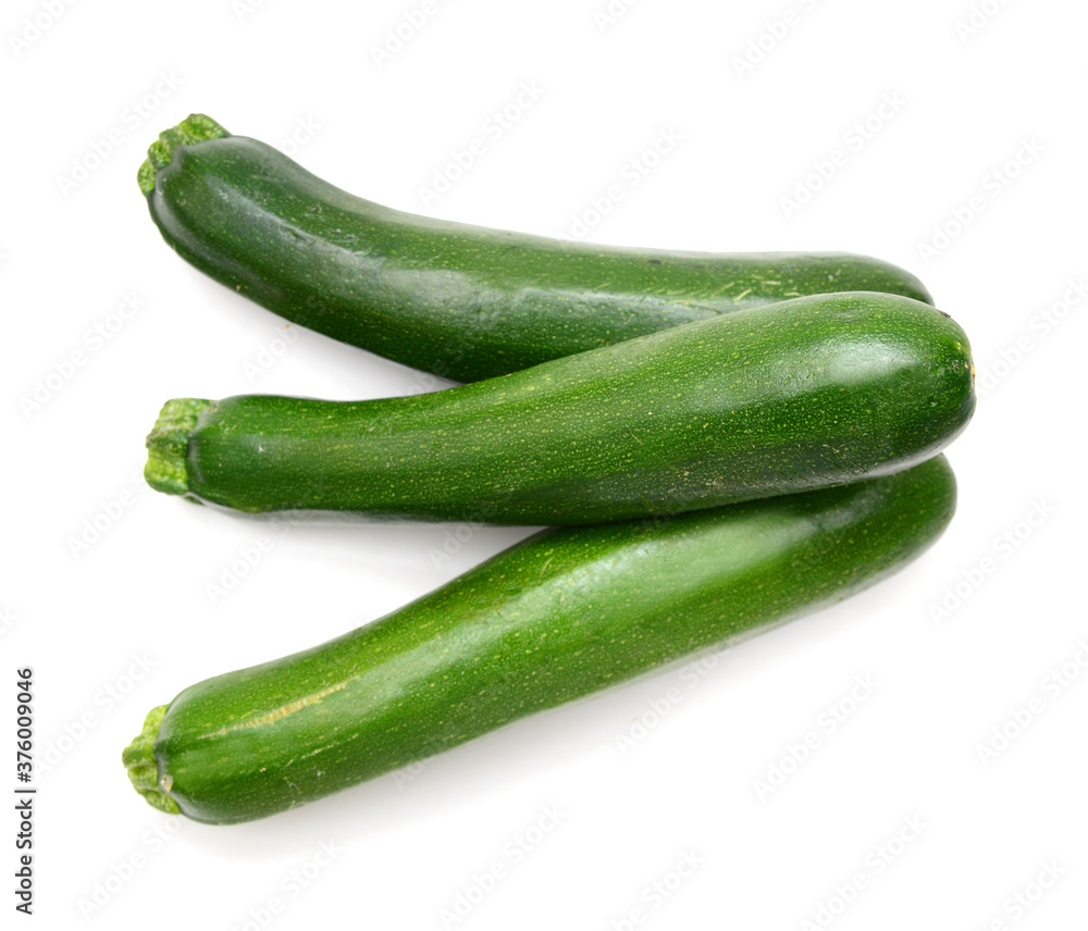 Stack fresh green zucchini isolated on white background Stack fresh green zucchini isolated on white background
