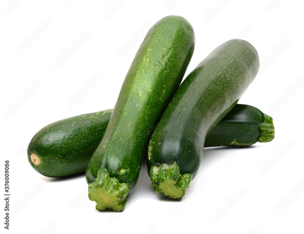 Stack fresh green zucchini isolated on white background Stack fresh green zucchini isolated on white background