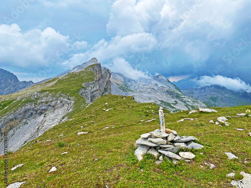 Alpine peak Chli Hohmad above the Tannensee lake (or Tannen lake) and in the Uri Alps mountain massif, Melchtal - Canton of Obwald, Switzerland (Kanton Obwalden, Schweiz) photo