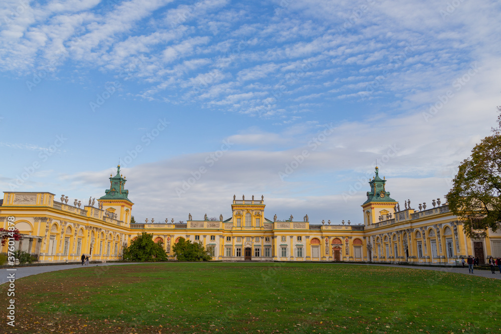 Beautiful view of the Royal Palace of Wilanow on a background of blue sky in sunny weather, Warsaw, Poland.