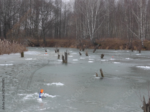 Moscow region/Russia - december 2019: Ice-fishing on the river
