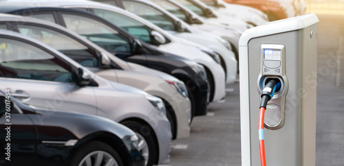 Quadro su tela Close-up of a electric charging station on the background of cars