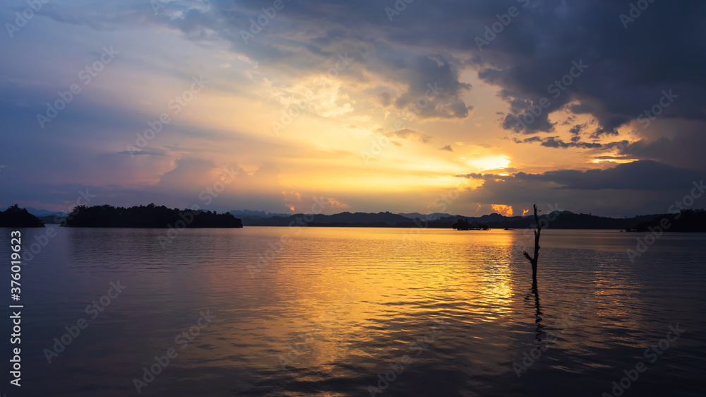 Pom Pee Reservoir at sunset and rays Pom Pee Reservoir at sunset and rays