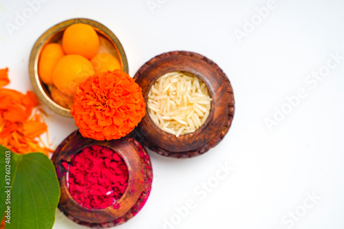 Kumkum and rice Natural color powders are used while worshipping God and an at auspicious occasions.