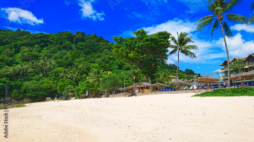Beautiful Merlin Beach located near Patong in Phuket Island Thailand. View on the jungle  sea  azure water and golden sand.