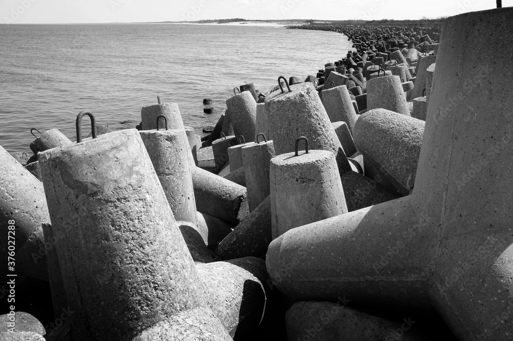As grey as concrete can be. Shoreline construction at the mouth of river Wisla (Vistula), Poland. As grey as concrete can be. Shoreline construction at the mouth of river Wisla (Vistula), Poland.