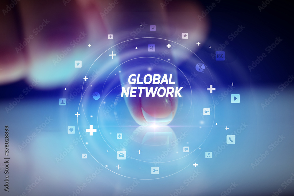 Finger touching tablet with social media icons and GLOBAL NETWORK Finger touching tablet with social media icons and GLOBAL NETWORK