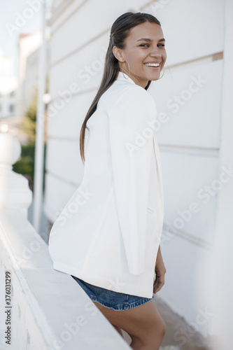 Beautiful smiling happy woman in casual wear outdoor