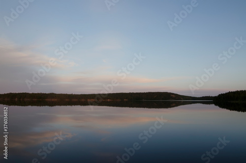 Sunset view from Zayachiy Island on the Upper Pulongskoye Lake in Karelia  Russia 