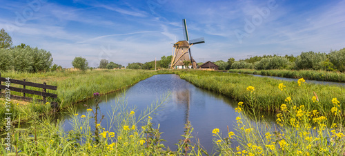 Panorama of historic windmill De Onrust in Noord-Holland, Netherlands